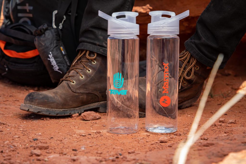 Marmot and Teva logos on waterbottles