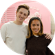 Speech bubble pointing right with a photo of the owners of Big Buns Club in the bubble