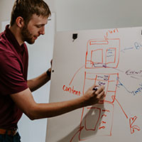 Man drawing diagram