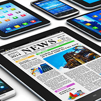 tablets and phones with news articles