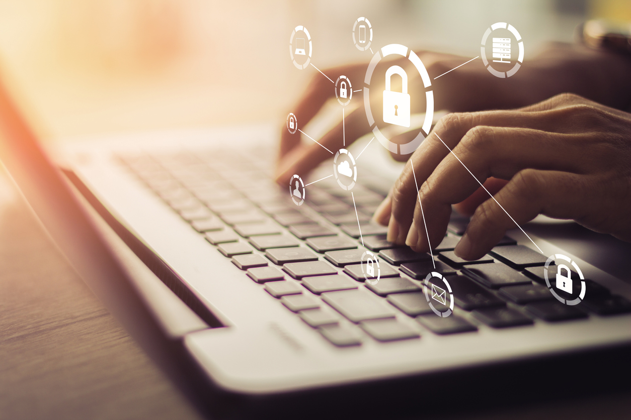Male on computer for Cybersecurity